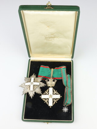 An Italian Republic Order of Merit neck badge and breast star together with a miniature, boxed 