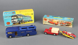 Corgi Major Toys, a Racing Car Transporter 1126 together with a Corgi Toys Gift Set no.17, Land Rover with Ferrari Racing car and trailer  