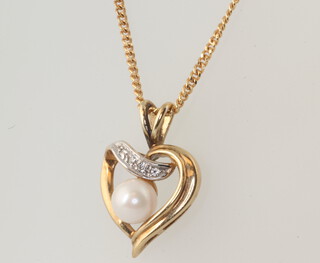 A yellow metal 9ct chain 38cm and a cultured pearl set heart pendant 3.9 grams 