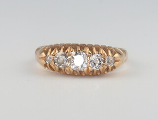 An 18ct yellow gold graduated 5 stone diamond ring, approx 0.5ct, size O 1/2, 3.4 grams 