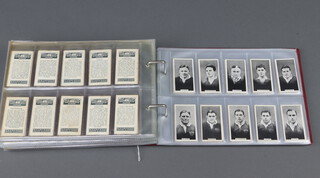 Wills cigarette cards, a binder of complete sets to include - British Rugby Players, Village Models (large), Village Models (small), Steamers,  New Zealand Birds, Regimental Standards and Cap Badges, Birds, Beasts and Fishes, Coaches and Coaching Days, Children of All Nations, Famous Inventions, Dogs, Railway Working, Etchings of Dogs, Large Etchings, Household Hints, Heraldic Signs, Household Hints, Pirates and Highway Men, Past and Present, Wonders of The World