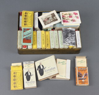 A collection of approx 50 Kensitas Flowers Silks in Kensitas packets and a box of Players/Wills/Churchmans cigarette cards (all low cat value) to include Players Animals of The Countryside, Wills Railway Engines, Radio Celebrities, Safety First etc all contained in old cigarette packets 