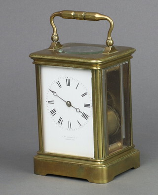 A 19th Century French 8 day striking carriage clock with enamelled dial, Roman numerals, marked J E Caldwell & Co. Philadelphia, contained in a gilt metal case 12cm h x 9cm w x 8cm d (no key)