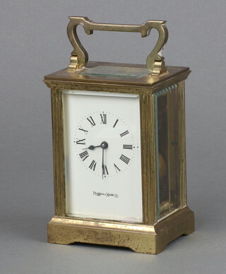 Mappin and Webb, a 20th Century 8 day carriage timepiece with 6cm enamelled dial, Roman numerals, contained in a gilt metal case 11cm h x 8cm w x 6cm d (no key) 