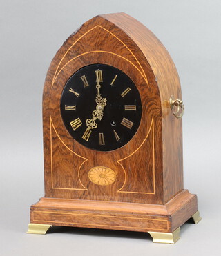 A 19th Century French 8 day striking bracket clock, the back plate marked 1061, with ebonised dial contained in an inlaid rosewood lancet case, 42cm h x 29cm w x 19cm d, complete with key 