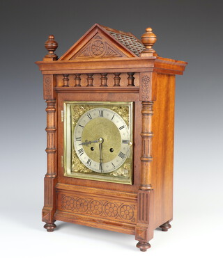 A 19th Century French striking bracket clock with 14cm gilt dial, silvered chapter ring and Roman numerals, contained in a carved walnut case 47cm h x 28cm w x 18cm d complete with pendulum and key 