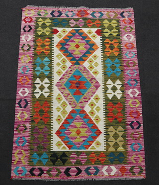 A white, pink and brown ground Maimana Kilim rug with 3 diamonds to the centre 154cm x 102cm  