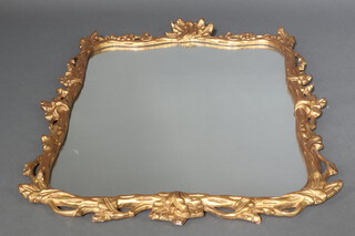 A 1950's Rococo style shaped plate wall mirror contained a gilt frame 114cm x 78cm