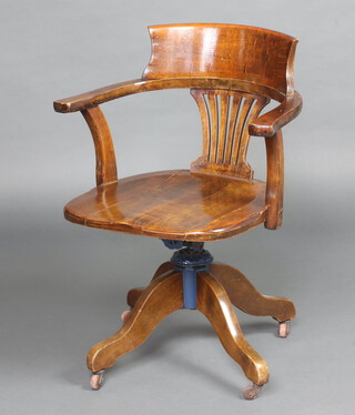 An Edwardian beech framed slat back revolving office chair with solid seat 84cm h x 64cm w x 47cm d (seat 30cm x 33cm) 