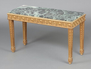 A Louis style rectangular gilt painted side table with inset green marble panelled top, raised on square tapered supports 49cm h x 81cm w x 86cm d 