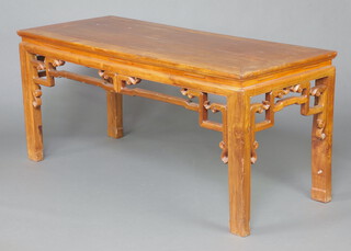 A rectangular Chinese pierced and carved hardwood side table 83cm h x 184cm w x 75cm d 