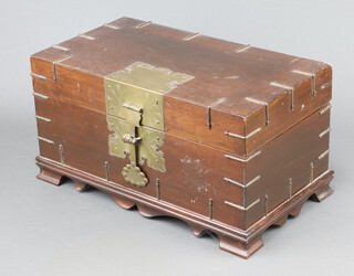 A rectangular Chinese hardwood trinket box with hinged lid and brass lock, raised on bracket feet 20cm h x 41cm w x 23cm d 