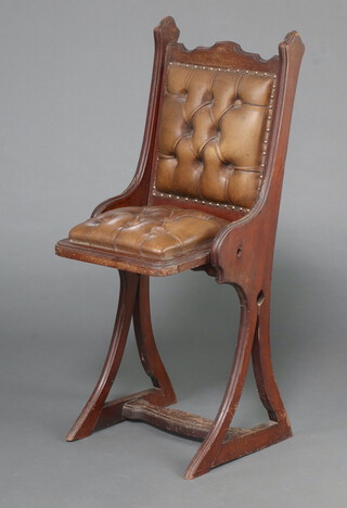 A Victorian mahogany framed chair, the folding seat and back upholstered in green buttoned leather 103cm h x 35cm w x 41cm d (seat 17cm x 20cm) 