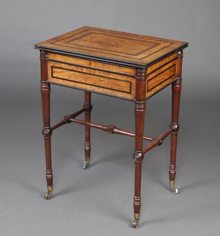 A Victorian rectangular walnut teapoy with ebonised stringing and hinged lid, fitted 2 caddies and mixing bowl receptacle, raised on turned supports, brass caps and casters 74cm h x 54cm w x 41cm d 