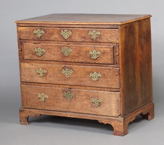 An 18th Century oak chest of 4 long drawers, having loafers to the side, raised on bracket feet 79cm h x 89cm w x 51cm d  (possibly the base to a taller chest) 