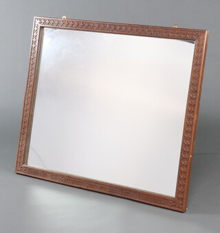 A German 19th Century rectangular plate mirror contained in a carved oak frame marked Sapientia Est Sperulum Sine Marulo Dei Maiesiaiblank 87cm x 101cm 