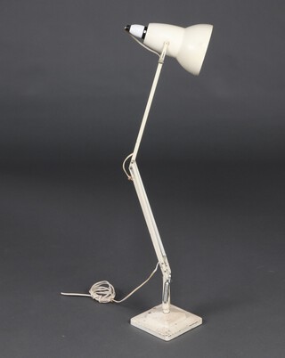 Herbert Terry, a white anglepoise lamp on a stepped base 87cm x 16cm for decorative purposes only