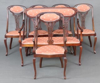 An Edwardian 6 piece mahogany show frame drawing room suite comprising triple chair back sofa raised on cabriole supports 99cm h x 130cm w x 48cm d (seat 94cm x 40cm), open armchair 102cm h x 52cm w x 48cm d (seat 28cm x 30cm) and 4 dining chairs 95cm h x 29cm w x 28cm d 