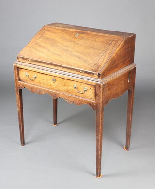 An 18th Century oak clerks slope on a later mahogany stand, fitted a drawer raised on square tapered supports 92cm h x 76cm w x 51cm d 