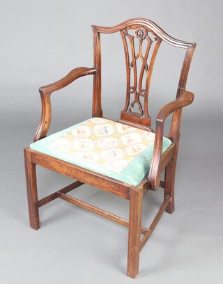 A Georgian mahogany slat back dining chair with pierced vase shaped slat back and upholstered drop in seat, raised on square tapered supports with H framed stretcher 96cm h x 63cm w x 50cm d (seat 26cm x 30cm) 