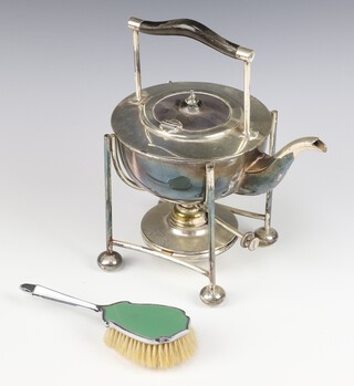 A stylish silver plated tea kettle, burner and stand, retailed by Selfridges 