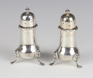 A pair of silver baluster peppers Birmingham 1933, 114 grams 10cm