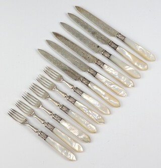 A set of silver and mother of pearl dessert eaters for 6 with engraved blades, Sheffield 1901