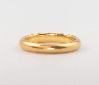 A 22ct yellow gold wedding band, size L, 5.1 grams 