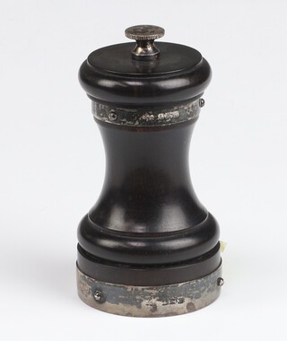 A silver mounted ebony pepper mill Birmingham 1931 10cm