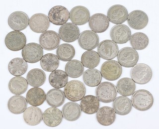 A quantity of pre-1947 florins and half crowns, 500 grams 