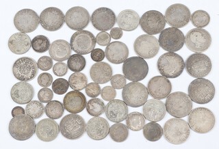 A quantity of pre-1947 shillings,  florins and half crowns, 500 grams 