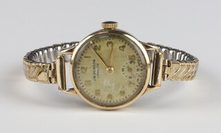 A lady's 9ct yellow gold wristwatch with seconds at 6 o'clock  by J W Benson, contained in a 22mm case on a gilt expanding bracelet 