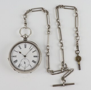 A 925 standard key wind pocket watch with seconds at 6 o'clock, contained in a 55mm case with seconds at 6 o'clock  on a silver Albert with T bar and 2 clasps 