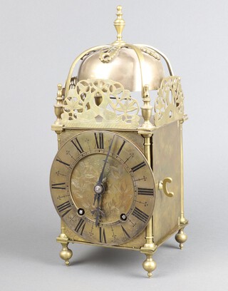 Winterhalder and Hofmeier, a striking lantern clock, the brass dial marked Tho's Mudge, striking on 2 bells, the back plate marked W and H SCH, 34cm h x 15cm w x 15cm d 