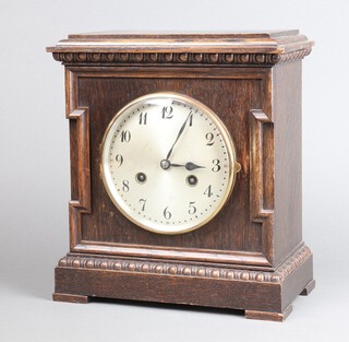 Junghans, a 1920's striking mantel clock with 13cm silvered dial, Roman numerals, striking on a gong, contained in an oak case, complete with pendulum and key, 28cm h x 25cm w x 14cm d 