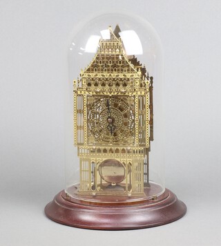 A Franklin Mint limited edition skeleton clock in the form of Big Ben, the back plated numbered 79-681, complete with dome, pendulum and key, 31cm h x 20cm 