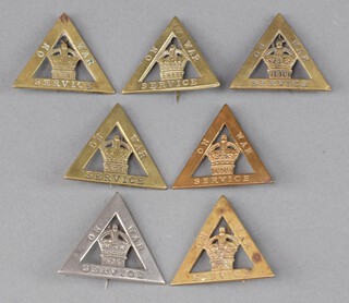 A First World War triangular chrome On War Service 1916 badge, together with 6 ditto brass  