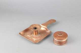 A Newlyn style square embossed copper chamber stick with fish decoration 7cm, together with a copper jar and cover 4cm h 