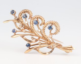 A 9ct yellow gold sapphire and diamond floral spray brooch 6.5 grams, 50mm 