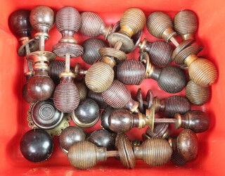 A collection of 14 19th Century double sided wooden door knobs and 7 single door knobs 