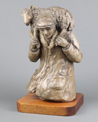 A bronzed figure of a shepherd with lamp, raised on an oak base 44cm h x 24cm w x 22cm d 