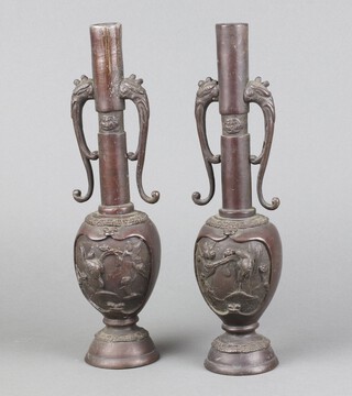 A pair of 19th Century Japanese bronze twin handled vases 29cm 