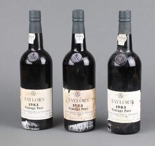 Three bottles of Taylors 1983 vintage port (1 label damaged) 