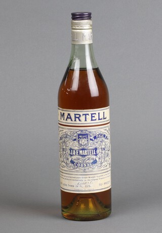 A 1970's bottle of Martell 70 percent proof cognac 24 fl. ozs - Very Old Pale