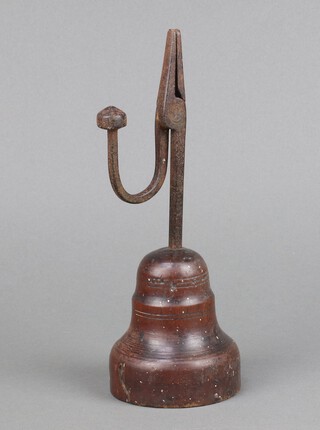 An 18th Century iron and turned mahogany rush light holder 24cm h 