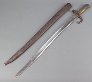 A chassepot bayonet, the blade dated 1874 complete with scabbard numbered 80883 