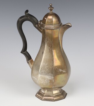 A Queen Anne style octagonal silver coffee pot with ebonised handle, Birmingham 1917, 419 grams, 25cm 