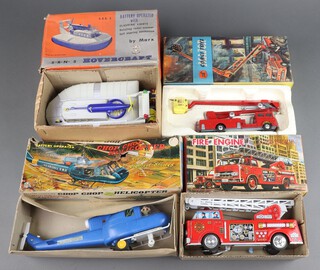 A collection of mid-Century boxed toys to include SRN 5 Hovercraft by Marx, Corgi Simon Snorkel fire engine, tin plate fire engine by SH and Chop Chop helicopter by Marx 