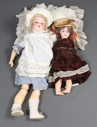 Armand Marseille, a pair of bisque headed dolls marked 390 A.5.M and A.12.M 