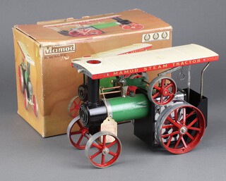 A Mamod steam traction engine TE1a, boxed with burner box and steering rod, fuel tray and funnel, plus spare fuel 